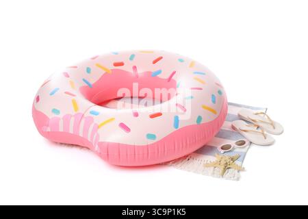 Inflatable ring in shape of donut, starfish and beach accessories isolated on white background, closeup Stock Photo