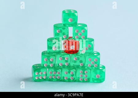 Stack of game dices on blue background Stock Photo