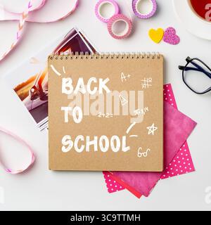 Creative back-to-school supplies arranged on a desk with writing materials and decorations for a productive study session Stock Photo