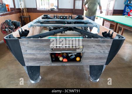 Pool table repair in a cafe Stock Photo