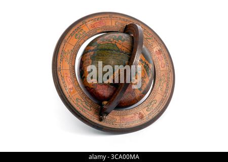 Vintage wooden globe showing Africa and South America on white background with zodiac signs Stock Photo