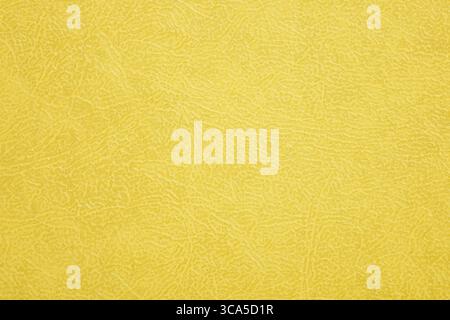 Golden textured leather or foil texture background. Abstract foil texture for artwork. Stock Photo