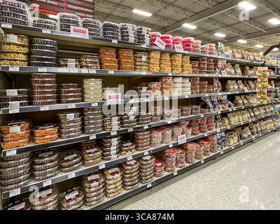Boxed of assorted nuts and candies on the shelves for sale in a supermarket. Alberta, Canada. Stock Photo