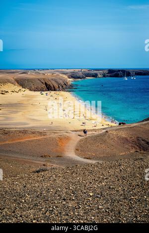 Playa Mujeres Beach, Lanzarote, Canary Islands, Spain – Golden Sand, Turquoise Waters and Volcanic Landscape Stock Photo