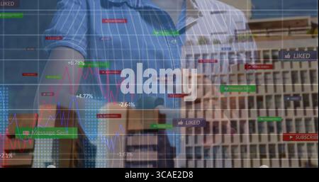 Analyzing two colleagues in striped shirts using digital interface in office, showing media metrics Stock Photo