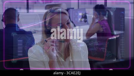 Smiling female agent wearing headset and typing on computer at call center, with data overlays Stock Photo