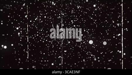 Displaying abstract pattern filling film strip, with white speckles and vertical scratches Stock Photo