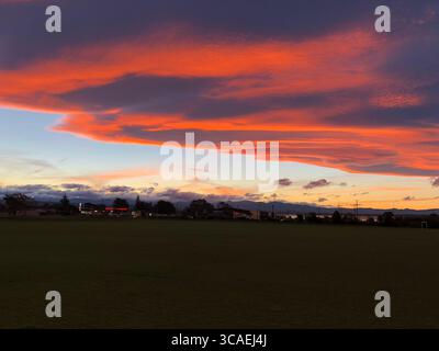 Sunset in New Zealand at Saxton Field looking back towards Richmond  calm before the storm approaching should be a great sunset Stock Photo