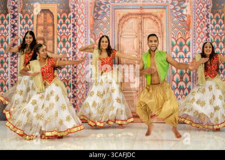 January 13, 2019, Garden Grove, California: Spirited dancers perform in ethnic costume at a ''Bollywood'' bridal festival for wealthy Indian Americans in Garden Grove, CA. (Credit Image: © Spencer Grant/ZUMA Press Wire) Stock Photo