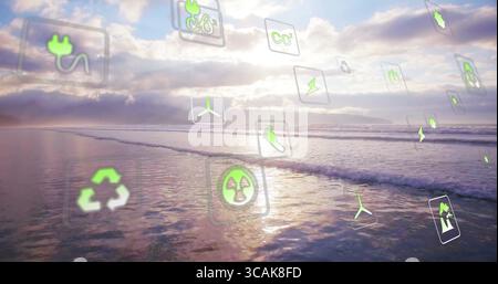Floating digital icons hovering above shoreline at low tide with renewable and recycling symbols Stock Photo