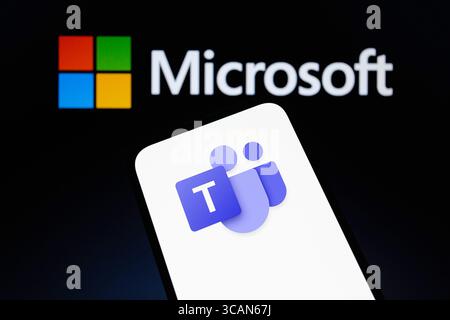 July 27, 2023, Asuncion, Paraguay: Microsoft Teams logo is displayed on a smartphone backdropped by Microsoft logo. (Credit Image: © Andre M. Chang/ZUMA Press Wire) Stock Photo