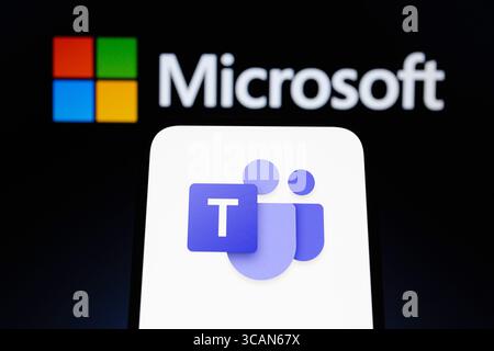 July 27, 2023, Asuncion, Paraguay: Microsoft Teams logo is displayed on a smartphone backdropped by Microsoft logo. (Credit Image: © Andre M. Chang/ZUMA Press Wire) Stock Photo