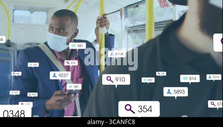 Holding smartphone, Black man wearing face mask gripping handrail on bus, with icons, copy space Stock Photo