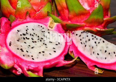 Fresh Dragon ( Pitaya ) fruit on  wooden table Stock Photo