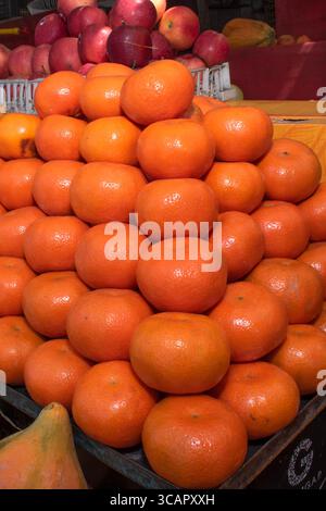Fresh organic oranges on the market place. Stock Photo