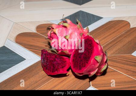 Pitaya or Dragon Fruit on wooden background Stock Photo