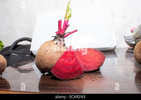 Fresh organic beet, beetroot. Red beets or beetroots on wooden background Stock Photo