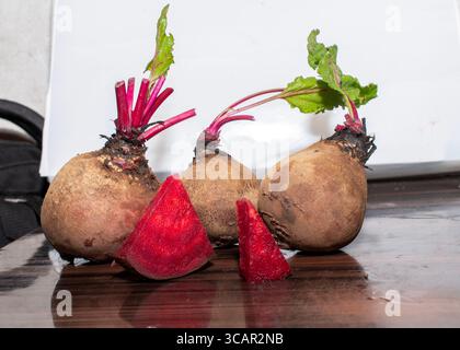 Fresh organic beet, beetroot. Red beets or beetroots on wooden background Stock Photo