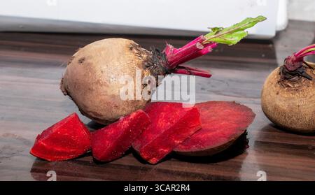 Fresh organic beet, beetroot. Red beets or beetroots on wooden background Stock Photo