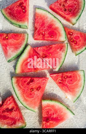 Fresh Watermelon Slices Arranged On Serving Plate With Vibrant Red fresh-watermelon-slices-arranged-on-serving-plate-with-vibrant-red