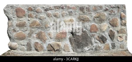 Fragment of new wall from big red granite stones and concrete . Isolated on white Stock Photo
