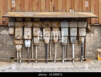 Weathered rusty industrial detail including old corroded electric control cabinets Stock Photo