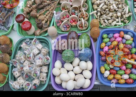 VILNIUS, LITHUANIA - MARCH 02, 2019: Traditional Lithuanian homemade wooden Easters eggs and gifts are sold on streets during the spring Kaziukas fair Stock Photo