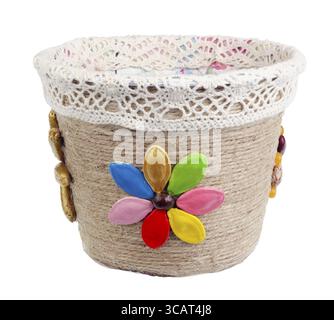 Easter handmade nest made from rope and pumpkin seeds. Isolated on white studio macro shot Stock Photo