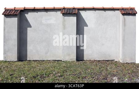 Fragment of the old brick plastered wall with a red tile covering. Isolated with patch Stock Photo