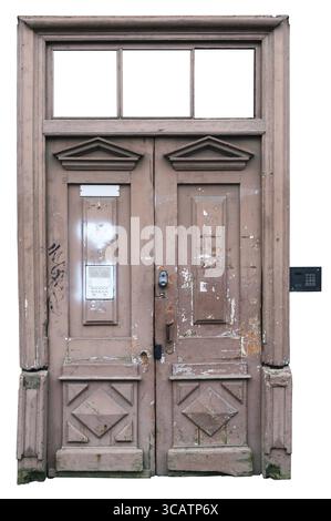 Rotten curve pink vintage door. Peeling paint and scraps of old paper ads. Isolated on white with patch Stock Photo