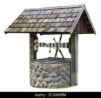 The basis of a old rural well is made of granite stones. For a roof pine boards and logs are used. Isolated on white Stock Photo