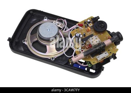 Retro old broken transistors radio device. No name mass production. Isolated on white Stock Photo