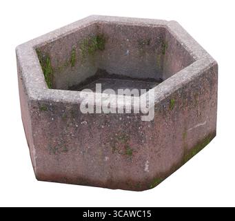 Street outdoor trash bin is made from aged retro mossy granite stone. Isolated on white Stock Photo