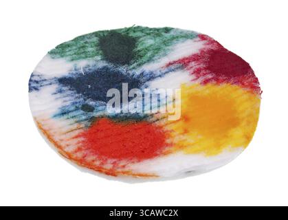 Round cotton napkin wiped paint from Easter eggs. Isolated on white ctudio macro Stock Photo