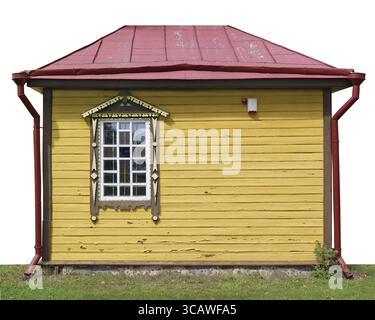 Aged handmade village shed wall are made from yellow planks. Isolated on white Stock Photo