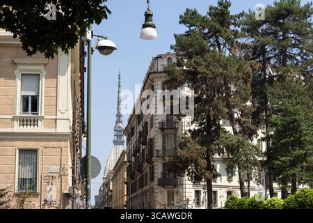 Street in Turin, with the Mole Antonelliana in the background, Turin, Piedmont, Italy Stock Photo