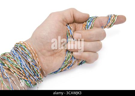 Technician has prepared a computer internet twisted pair cable for connection Stock Photo