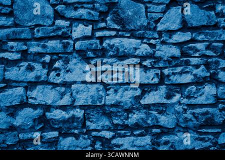 a wall made of blue limestone. background Stock Photo