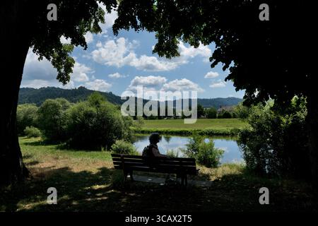 Gengenbach, Germany: Idyllic view of the Kinzig River outside the city walls. Gengenbach  is a small, idyllic town in the Black Forest Stock Photo