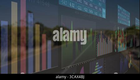 Floating dashboard over rural highway showing bar charts, line graphs, pie charts, numeric tables Stock Photo