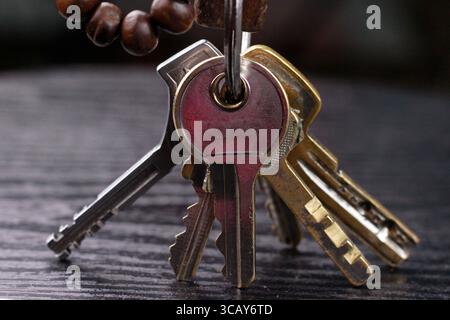 Bunch of keys on a black background Stock Photo