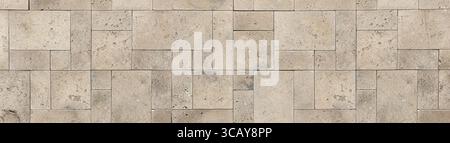 Beige travertine cladding tiles creating a geometric pattern, ideal for modern architectural projects Stock Photo
