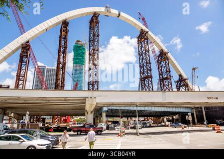 Miami Florida,Biscayne Boulevard,I-395 Signature Bridge The Fountain,arches arch under construction project,highway overpass,steel scaffolding red cra Stock Photo