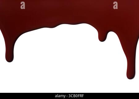 Melted chocolate dripping isolated on white background. Stock Photo