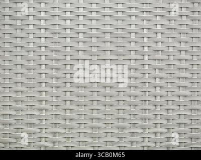 white-grey rattan weave of an outdoor chair. – Copyspace Stock Photo