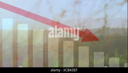 Displaying red downward arrow overlaying rural grassland, with bars, red line graph, power towers Stock Photo
