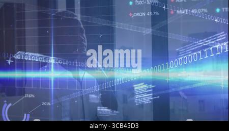 Observing executive analyzing holographic binary code on glass wall at high-rise office, copy space Stock Photo