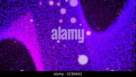 Swirling waves of purple and blue dots moving on abstract dark digital backdrop, with glowing spots Stock Photo