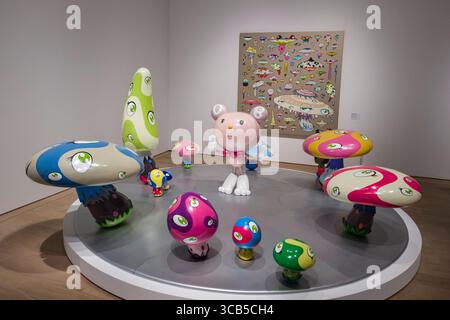Whimsical pop art installation showcasing vibrant colors and playful characters with unique eye designs during Kyoto City KYOCERA Museum of Art Stock Photo