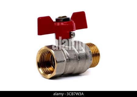 A detailed shot of a brass ball valve with a red handle against a clean white background. Ideal for plumbing, engineering, and DIY projects. Stock Photo